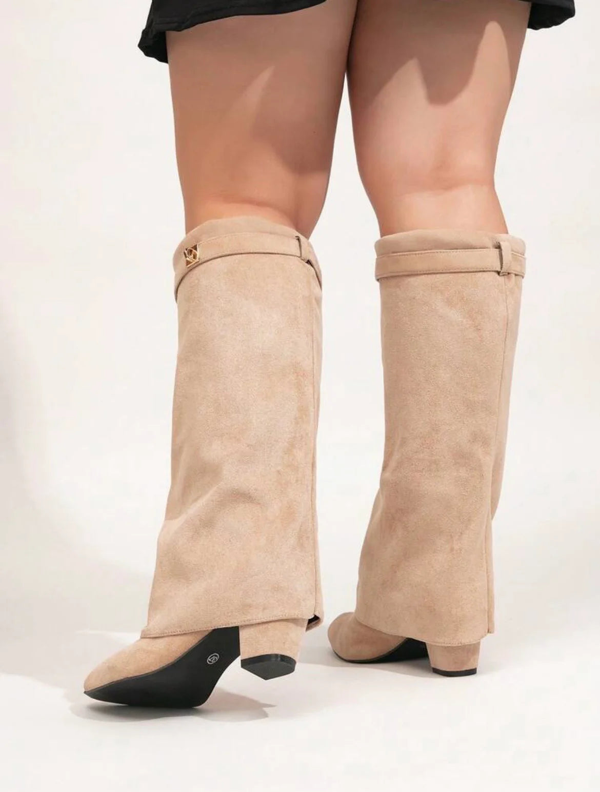 Les iconiques bottes Shark Lock 