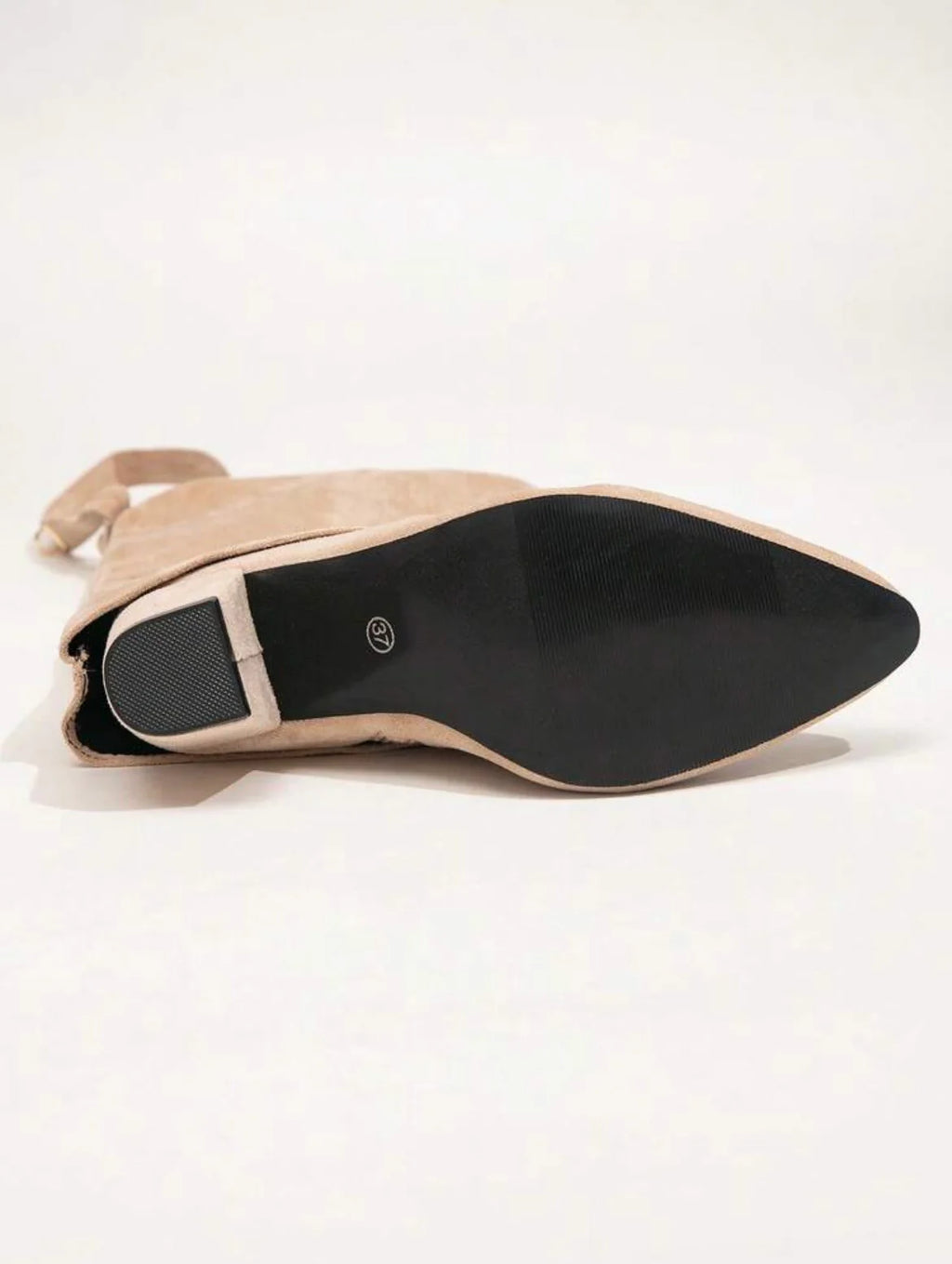 Les iconiques bottes Shark Lock 